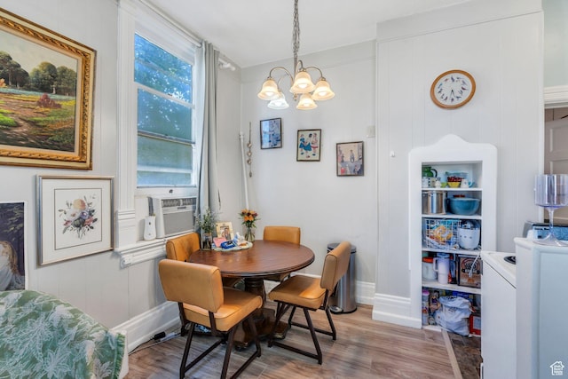 442 N 100 E, Provo, UT 84606 - dining space featuring a chandelier, wood finished floors, and cooling unit