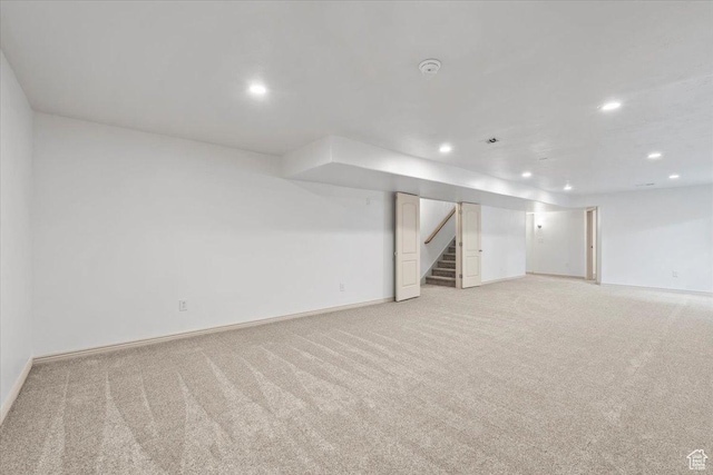 1827 E 1530 S, Spanish Fork, UT 84660 - finished below grade area featuring light carpet, recessed lighting, and stairway