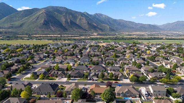 1827 E 1530 S, Spanish Fork, UT 84660 - aerial view of property and surrounding area featuring nearby suburban area and a mountainous background