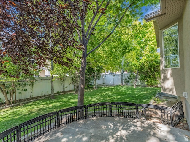 4587 W Flintlock Way, Herriman, UT 84096 - fenced backyard with a patio area
