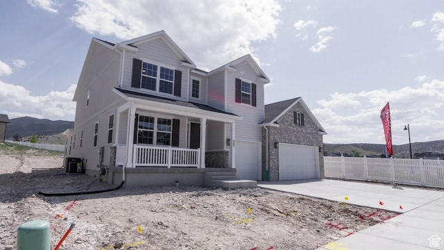 903 W Fallow Dr Unit 212, Saratoga Springs, UT 84045 - view of front of property featuring covered porch, driveway, and brick siding