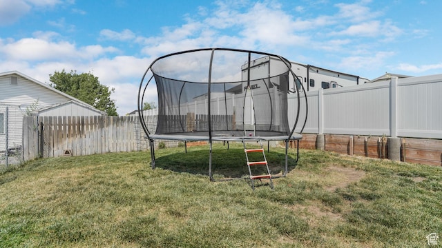 285 W 90 N, Clearfield, UT 84015 - fenced backyard with a trampoline