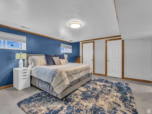 4273 W Annapolis Dr S, West Valley City, UT 84120 - bedroom with concrete floors and crown molding