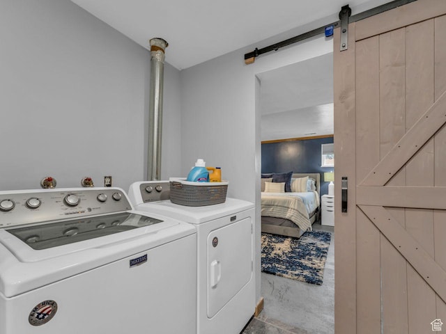 4273 W Annapolis Dr S, West Valley City, UT 84120 - washroom with washer and dryer and a barn door