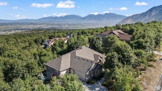 1155 S Eagle Nest Dr, Woodland Hills, UT 84653 - aerial view of property and surrounding area featuring a mountainous background and a forest