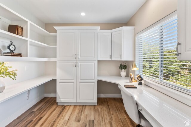 1155 S Eagle Nest Dr, Woodland Hills, UT 84653 - office featuring built in desk, light wood-style flooring, and recessed lighting