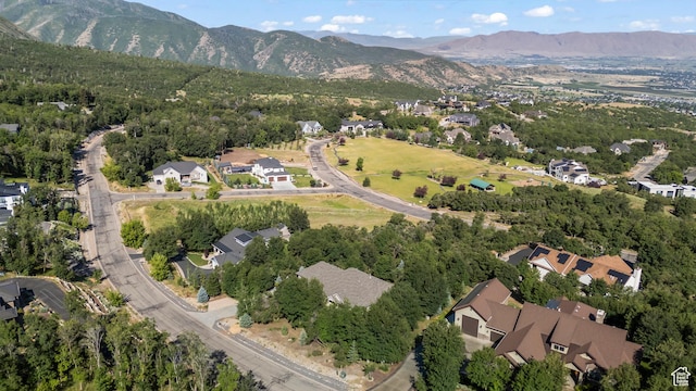 1155 S Eagle Nest Dr, Woodland Hills, UT 84653 - aerial overview of property's location featuring a mountain backdrop and nearby suburban area