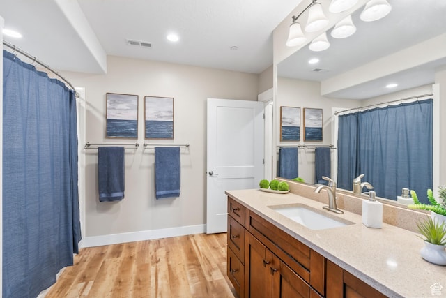 1155 S Eagle Nest Dr, Woodland Hills, UT 84653 - bathroom with vanity, wood finished floors, curtained shower, and recessed lighting