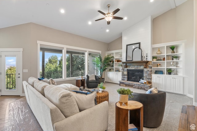 1155 S Eagle Nest Dr, Woodland Hills, UT 84653 - living room featuring plenty of natural light, a stone fireplace, a ceiling fan, high vaulted ceiling, and recessed lighting