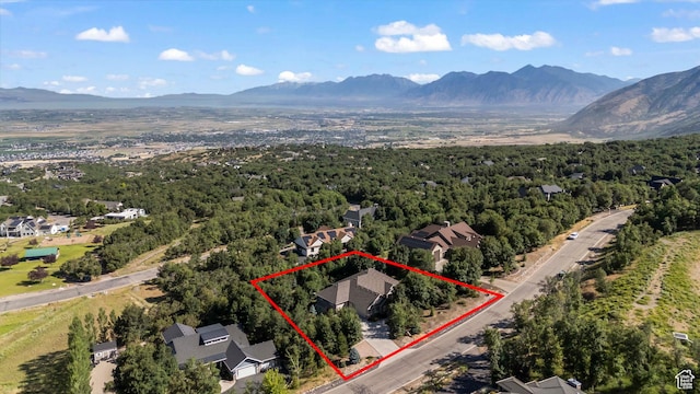1155 S Eagle Nest Dr, Woodland Hills, UT 84653 - aerial overview of property's location with a mountain backdrop and property boundaries highlighted