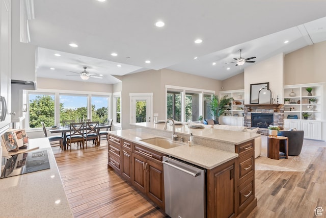 1155 S Eagle Nest Dr, Woodland Hills, UT 84653 - kitchen featuring dishwasher, a ceiling fan, an island with sink, light wood finished floors, and recessed lighting