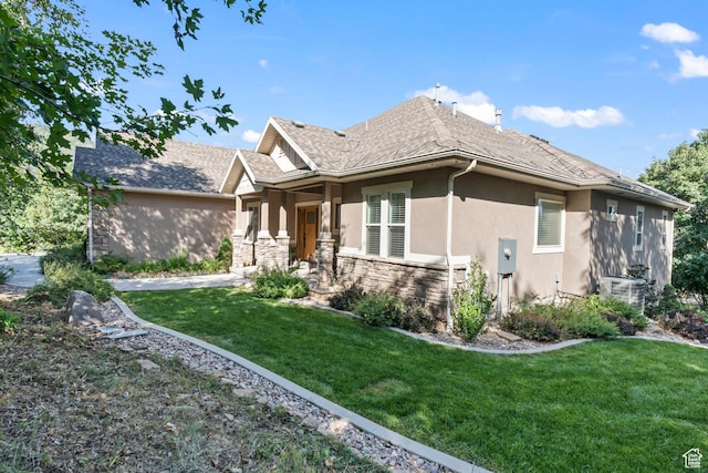 1155 S Eagle Nest Dr, Woodland Hills, UT 84653 - view of front of property featuring stucco siding, stone siding, a front yard, and roof with shingles