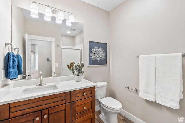 1155 S Eagle Nest Dr, Woodland Hills, UT 84653 - bathroom with vanity, a stall shower, and wood finished floors