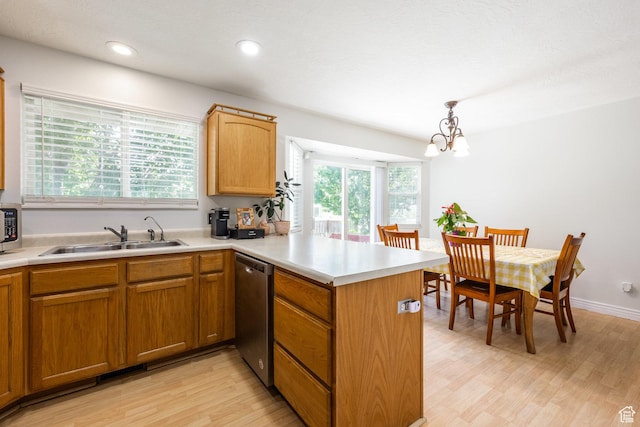 2080 E Fall St, Eagle Mountain, UT 84005 - kitchen with dishwasher, a peninsula, light wood-style floors, a chandelier, and recessed lighting
