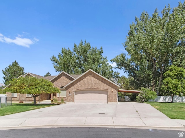 643 E 140 N, American Fork, UT 84003 - view of front of house with brick siding, driveway, and a garage