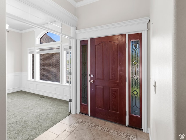 643 E 140 N, American Fork, UT 84003 - entryway featuring light tile patterned floors, crown molding, and wainscoting