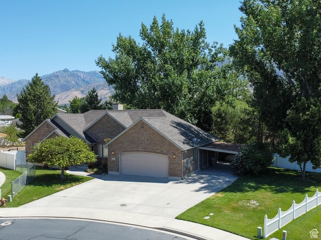 643 E 140 N, American Fork, UT 84003 - single story home featuring driveway, brick siding, a garage, a mountain view, and a carport