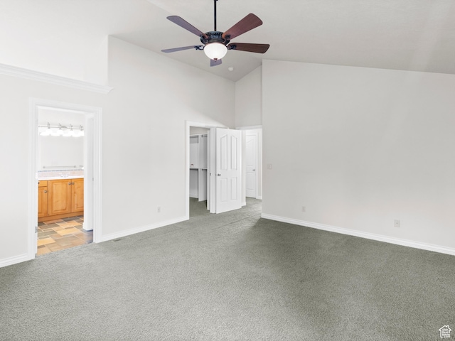 643 E 140 N, American Fork, UT 84003 - unfurnished bedroom with carpet flooring, high vaulted ceiling, a walk in closet, connected bathroom, and a ceiling fan