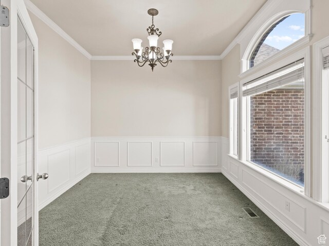 643 E 140 N, American Fork, UT 84003 - empty room with light colored carpet, a chandelier, ornamental molding, and wainscoting