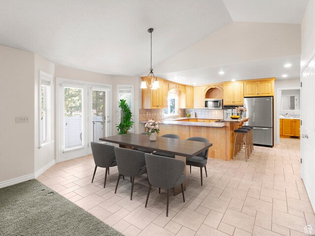 643 E 140 N, American Fork, UT 84003 - dining space featuring vaulted ceiling and recessed lighting