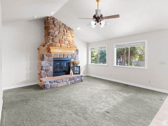 643 E 140 N, American Fork, UT 84003 - unfurnished living room with a stone fireplace, lofted ceiling, ceiling fan, and carpet