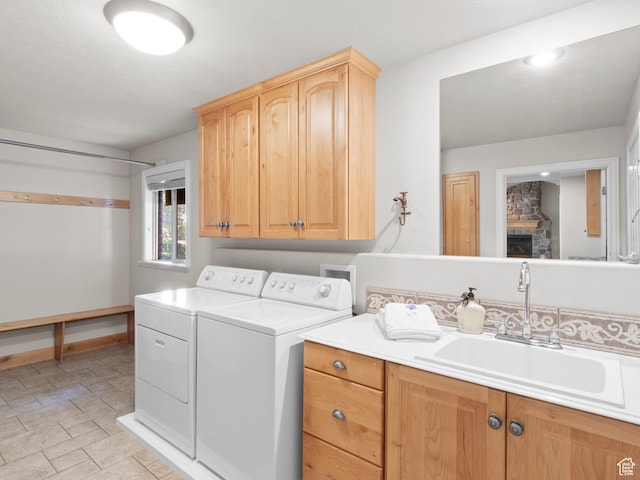 643 E 140 N, American Fork, UT 84003 - laundry area featuring separate washer and dryer, cabinet space, and stone finish floors