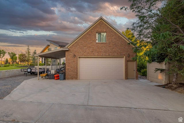 192 E 2200 N, Lehi, UT 84043 - view of front of property featuring a garage, brick siding, and driveway