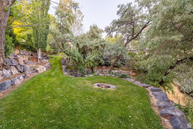 192 E 2200 N, Lehi, UT 84043 - view of green lawn with an outdoor fire pit