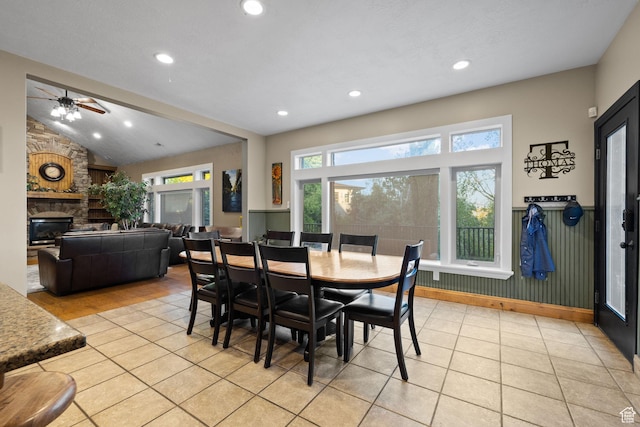 192 E 2200 N, Lehi, UT 84043 - dining space featuring plenty of natural light, light tile patterned floors, recessed lighting, a fireplace, and vaulted ceiling