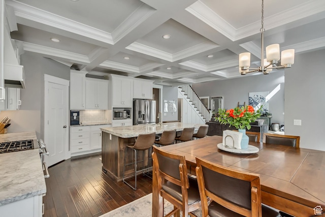 467 E Island View Cir N, Farmington, UT 84025 - dining space featuring beamed ceiling, a chandelier, dark wood-style floors, crown molding, and coffered ceiling