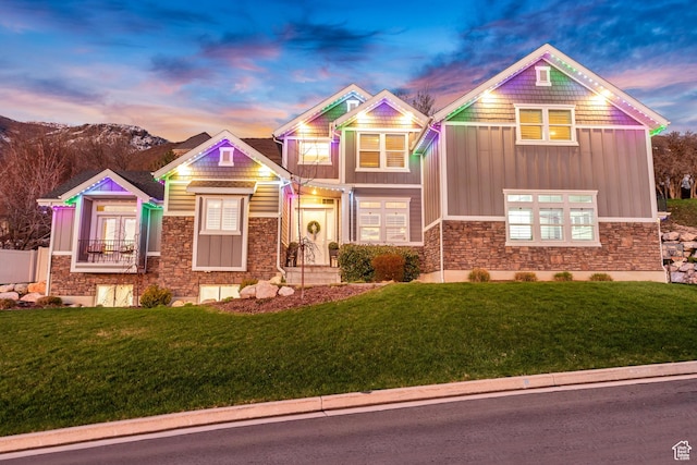 467 E Island View Cir N, Farmington, UT 84025 - view of front of house with stone siding, board and batten siding, and a front yard