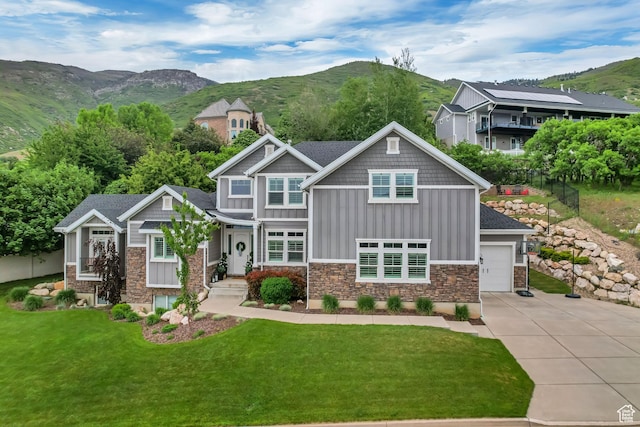 467 E Island View Cir N, Farmington, UT 84025 - craftsman-style home featuring board and batten siding, stone siding, concrete driveway, a mountain view, and a garage