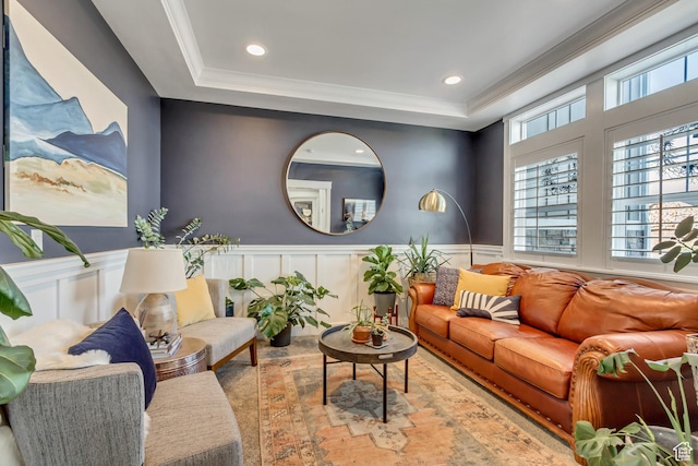 467 E Island View Cir N, Farmington, UT 84025 - living area with ornamental molding, a tray ceiling, recessed lighting, a decorative wall, and wood finished floors