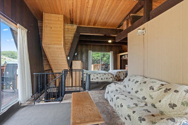 9406 Deer Creek Dr Unit 1074, Heber City, UT 84032 - living area featuring wood walls, carpet, wood ceiling, and an upstairs landing