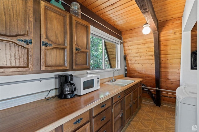 9406 Deer Creek Dr Unit 1074, Heber City, UT 84032 - kitchen featuring washer / clothes dryer, white microwave, wood ceiling, and wood walls