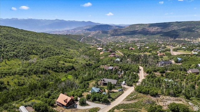 9406 Deer Creek Dr Unit 1074, Heber City, UT 84032 - aerial overview of property's location with mountains and a heavily wooded area