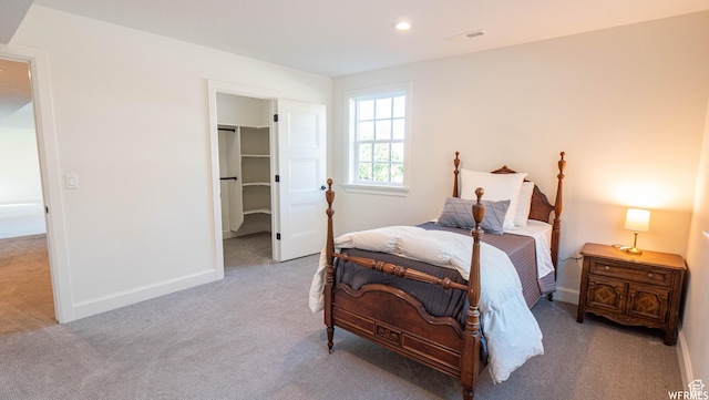2295 E Woodchuck Way, Sandy, UT 84093 - bedroom featuring carpet, recessed lighting, and a walk in closet