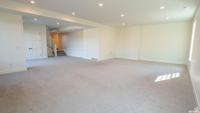 2295 E Woodchuck Way, Sandy, UT 84093 - empty room featuring recessed lighting, light carpet, and stairs