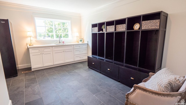 2295 E Woodchuck Way, Sandy, UT 84093 - mudroom featuring a sink and ornamental molding