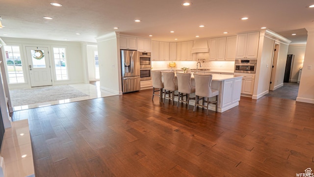 2295 E Woodchuck Way, Sandy, UT 84093 - kitchen featuring stainless steel appliances, dark wood-type flooring, light countertops, recessed lighting, and tasteful backsplash