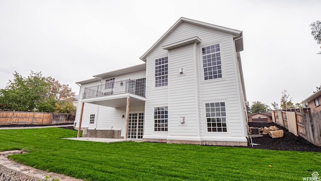 2295 E Woodchuck Way, Sandy, UT 84093 - rear view of house with a balcony, a fenced backyard, and a patio