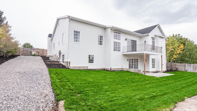 2295 E Woodchuck Way, Sandy, UT 84093 - back of property with a balcony, a patio, and a gate