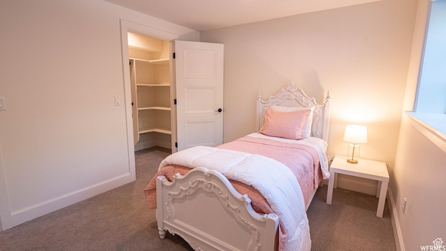 2295 E Woodchuck Way, Sandy, UT 84093 - bedroom with carpet flooring and a spacious closet