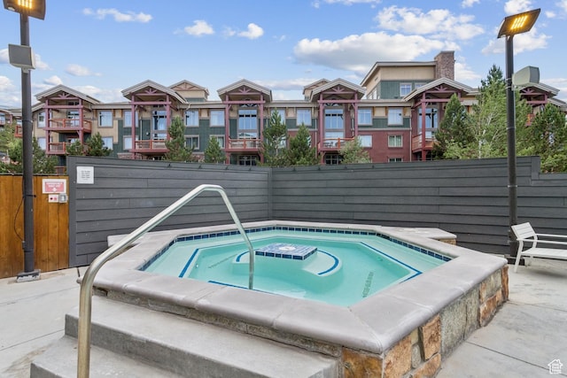 2670 Canyons Resort Dr Unit 417, Park City, UT 84098 - view of swimming pool with a hot tub and a residential view