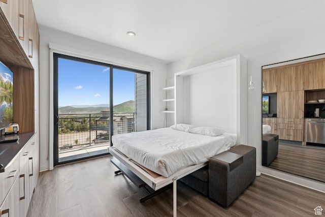 2670 Canyons Resort Dr Unit 417, Park City, UT 84098 - bedroom with access to exterior, dark wood finished floors, recessed lighting, and a mountain view