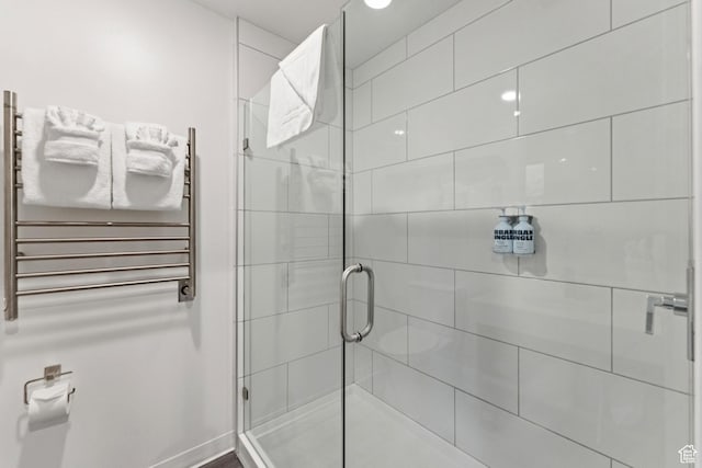 2670 Canyons Resort Dr Unit 417, Park City, UT 84098 - bathroom with radiator, a shower stall, and a towel warming rack
