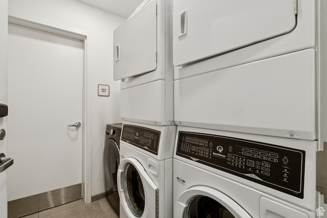 2670 Canyons Resort Dr Unit 417, Park City, UT 84098 - laundry area featuring washer and dryer and light tile patterned flooring