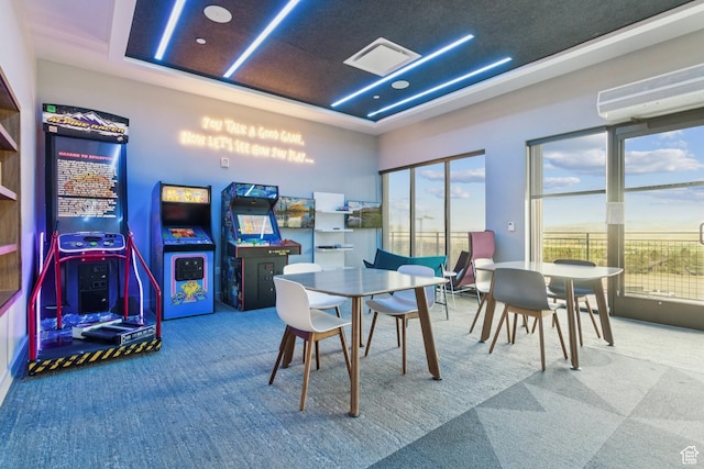 2670 Canyons Resort Dr Unit 417, Park City, UT 84098 - playroom with carpet, a raised ceiling, a wall mounted air conditioner, and plenty of natural light