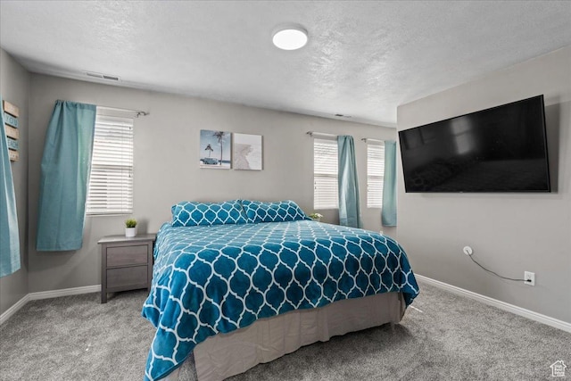 6801 W Tupelo Ln S, West Jordan, UT 84081 - carpeted bedroom featuring a textured ceiling and multiple windows