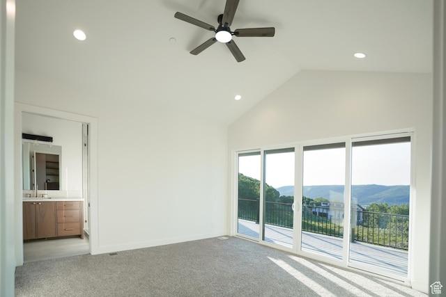 10135 E Clubhouse Rd, Heber City, UT 84032 - unfurnished bedroom featuring access to outside, light carpet, ensuite bath, high vaulted ceiling, and recessed lighting